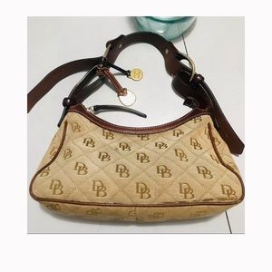 Inquiries VINTAGE Dooney & Bourke Monogram Leather strap Purse